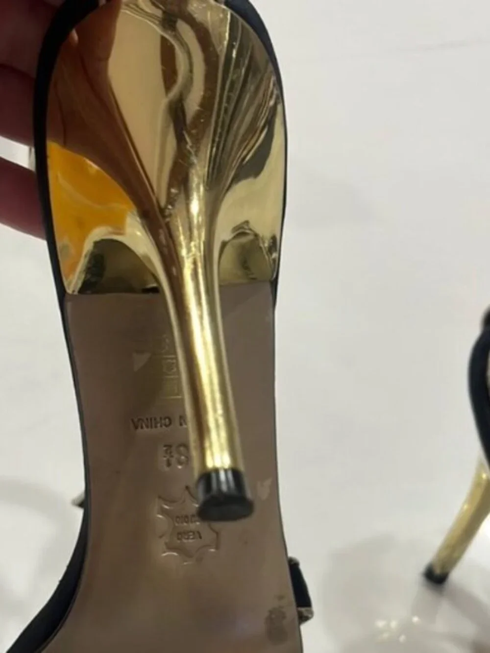 Karen Millen Black and Gold Heels with Sleek Design